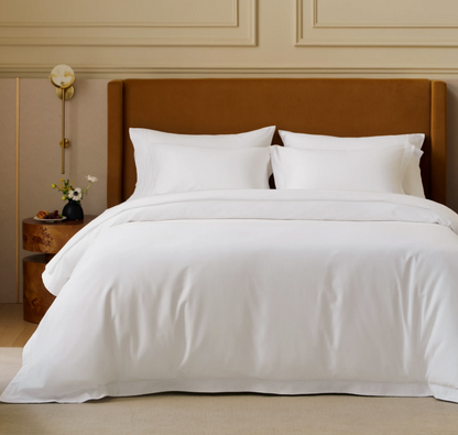 Luxury Duvet Cover in serene bedroom setting, highlighting the soft sateen weave and upscale design.