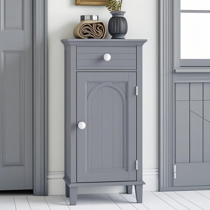 Aesthetic view of the Slim Grey Bathroom Storage Cabinet decorated with towels, demonstrating its function as a gray freestanding organizer.
