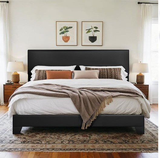 Modern aesthetic of the upholstered platform bed, making a strong design statement in the room.