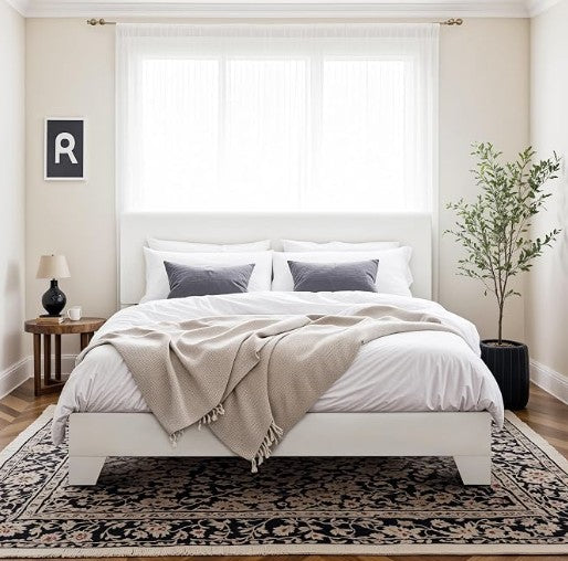 A cozy and stylish king-size upholstered platform bed providing maximum comfort and support.