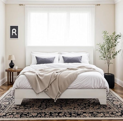 A cozy and stylish king-size upholstered platform bed providing maximum comfort and support.