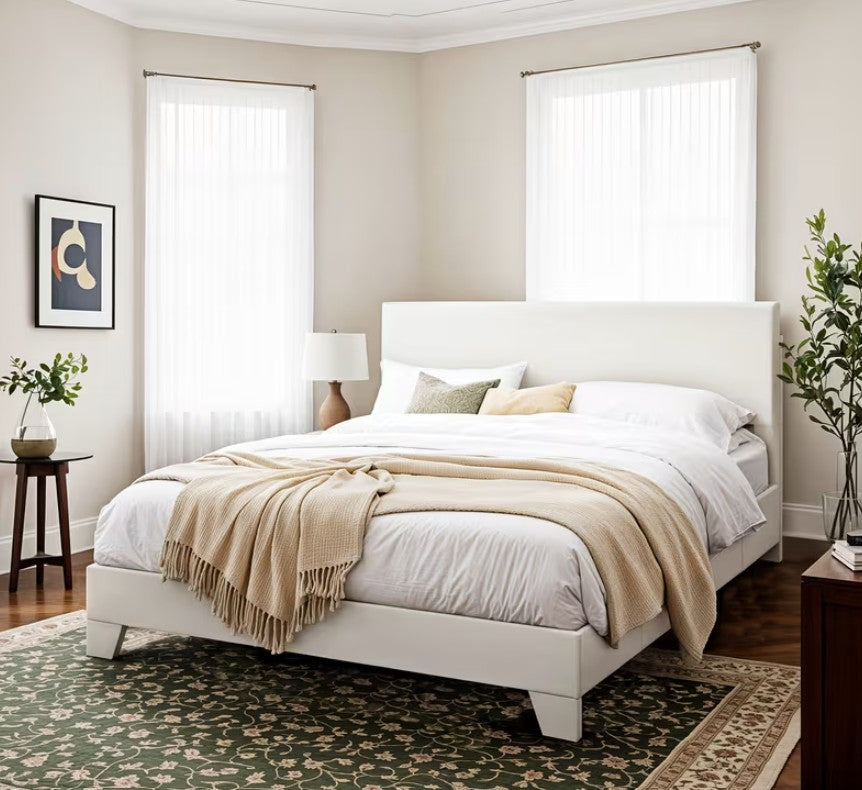 Full view of the upholstered platform bed frame demonstrating its elegant lines and design.