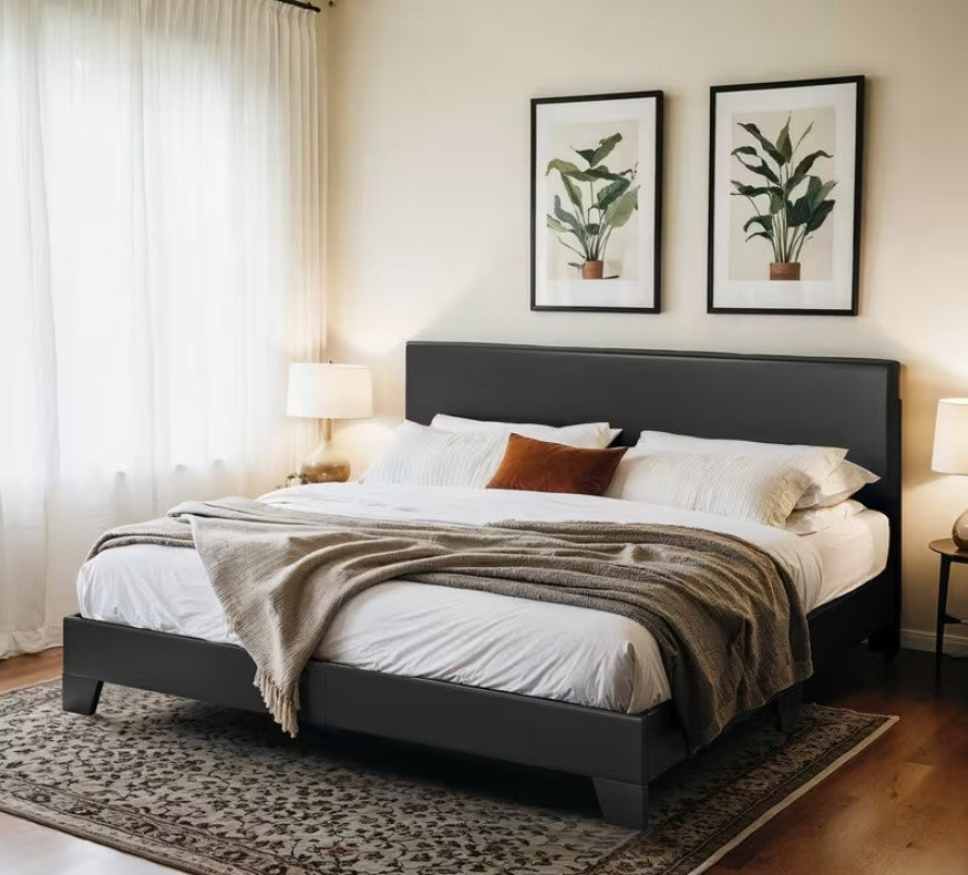 Contemporary bedroom featuring an upholstered platform bed in light grey, perfect for minimalist decor.