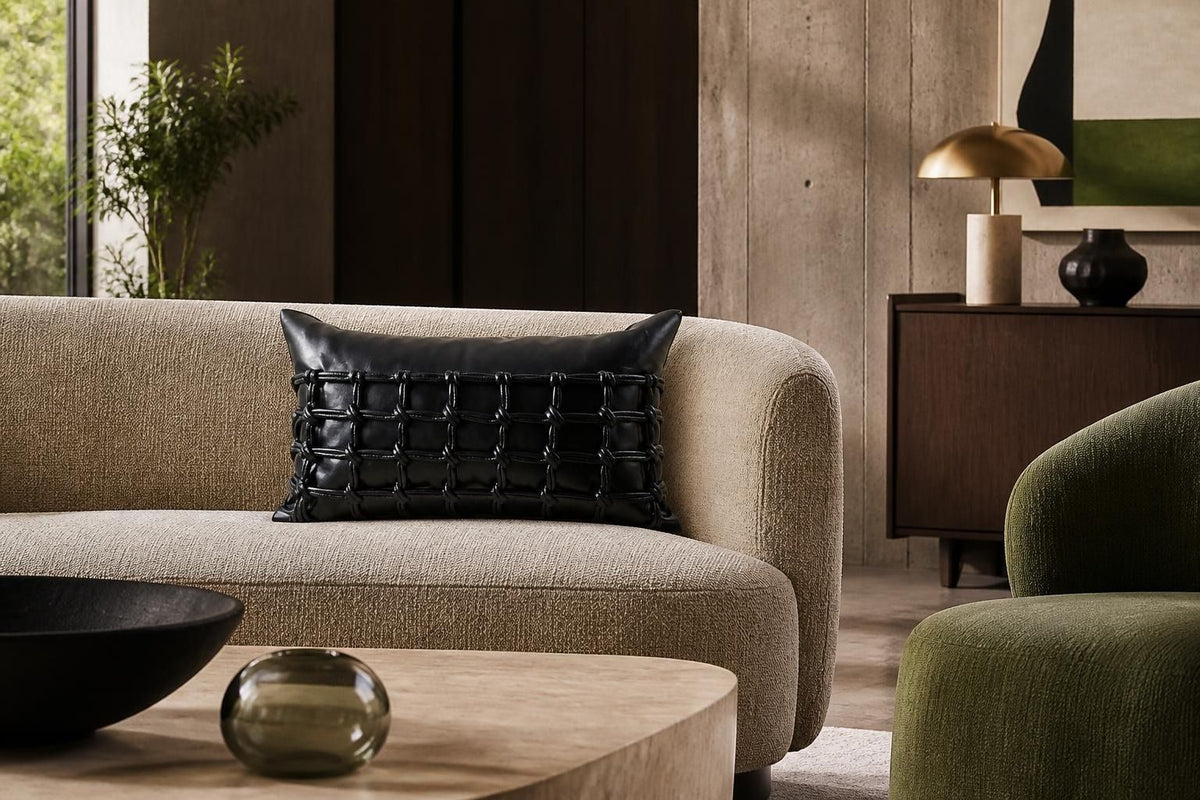 Tillbaka Faux Leather Throw Pillow Cover - Modern Minimalist Woven Hollow Design showing a square black faux leather pillow cover