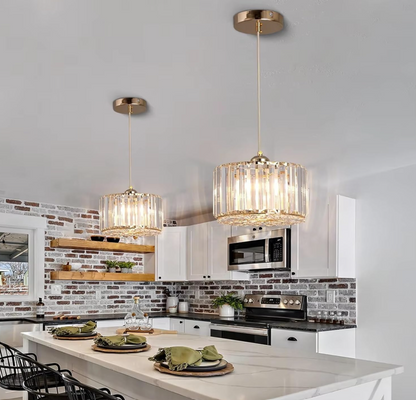 Stylish modern LED crystal pendant light shown over a dining table, creating an inviting ambiance.