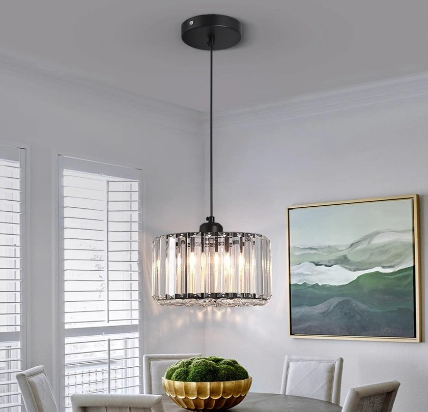 Aesthetic modern LED crystal pendant light enhancing a cozy nook in a home.