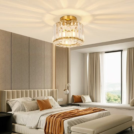 Modern LED crystal pendant light with a warm glow, perfect for intimate dining spaces.