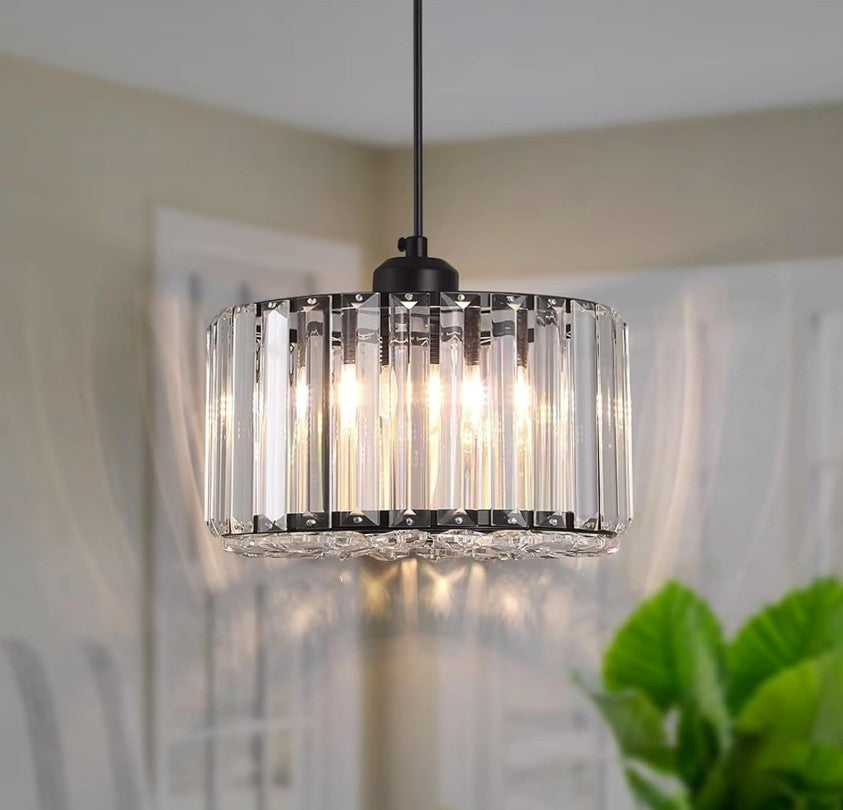 Sleek design of modern LED crystal pendant light shown against a stylish backdrop.