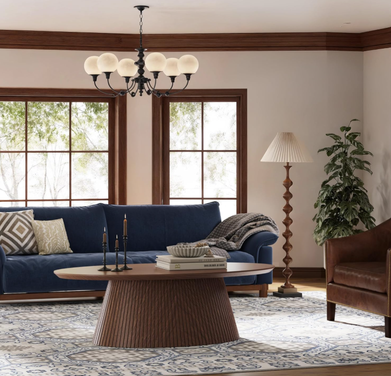 The generous surface area of the Mid Century Modern Oval Coffee Table, ideal for drinks and décor.
