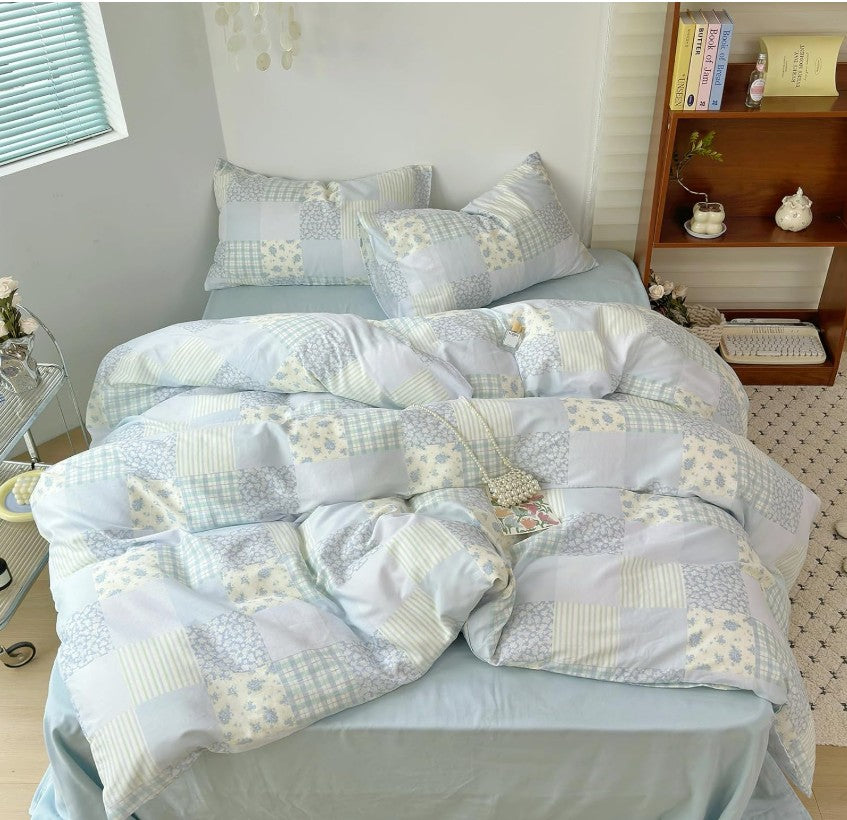 Blue Floral Patchwork Cotton Gauze Duvet Cover Set with pillowcases, ideal for a chic home upgrade.