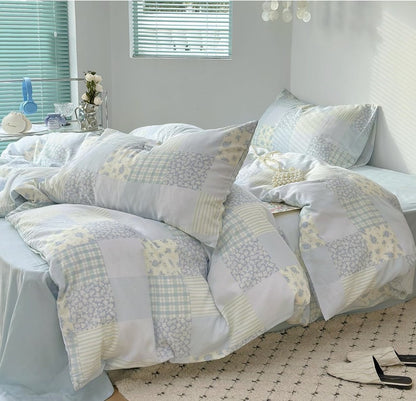 Soft ambiance created by Blue Floral Patchwork Cotton Gauze Duvet Cover Set, capturing the essence of boutique-inspired luxury.