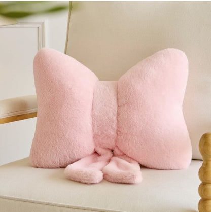 Detail of the Pink Bow Throw Pillow emphasizing soft faux rabbit fur texture and cute bow design.