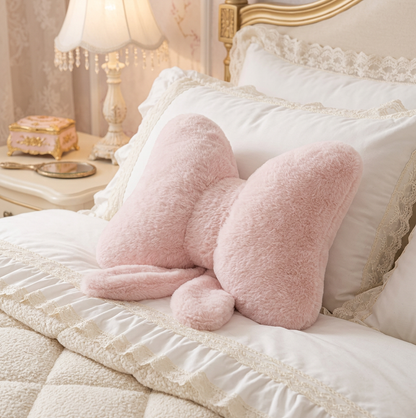 Pink Bow Throw Pillow beautifully arranged on a bed, reflecting a modern feminine style in home decor.
