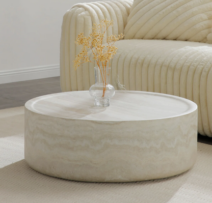 Close-up of the faux marble finish on the round coffee table, showcasing its high-end look.
