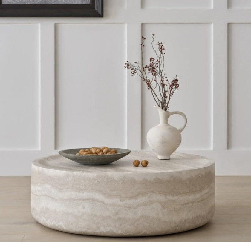 Round faux marble coffee table 31.5”, adding a designer touch to minimalist interiors.
