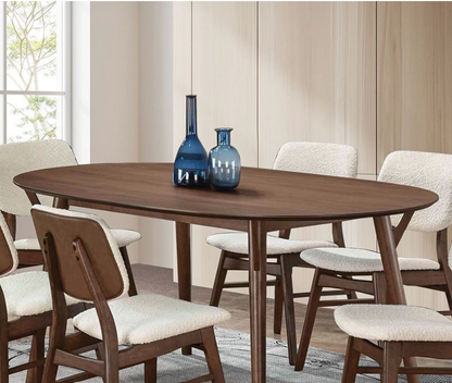 Mid-Century Walnut Oval Dining Table Set designed for 6–8, highlighting its elegant structure and finish.