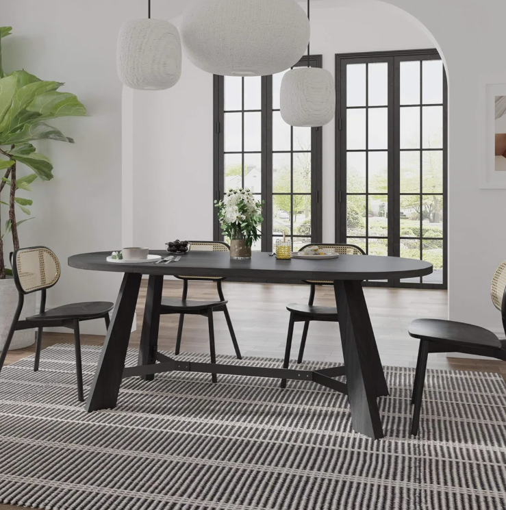 Overall look of the Mid-Century Walnut Oval Dining Table Set that features a unique design for stylish dining.