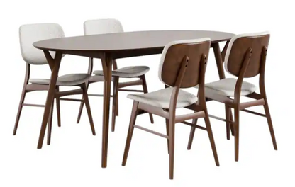 Mid-Century Walnut Oval Dining Table Set styled with modern accessories and warm lighting for a cozy atmosphere.