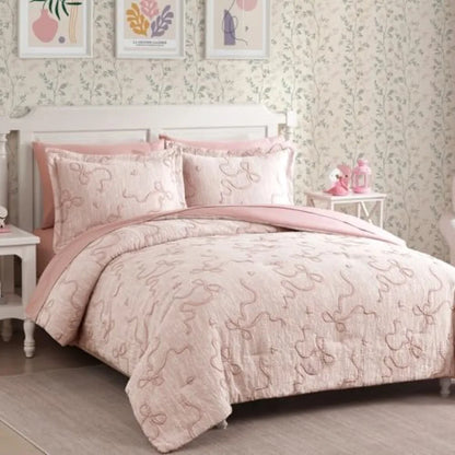 Cozy bedroom adorned with Luxury Blush Pink Bowknot Comforter Set, the perfect blush pink comforter set for a romantic retreat.