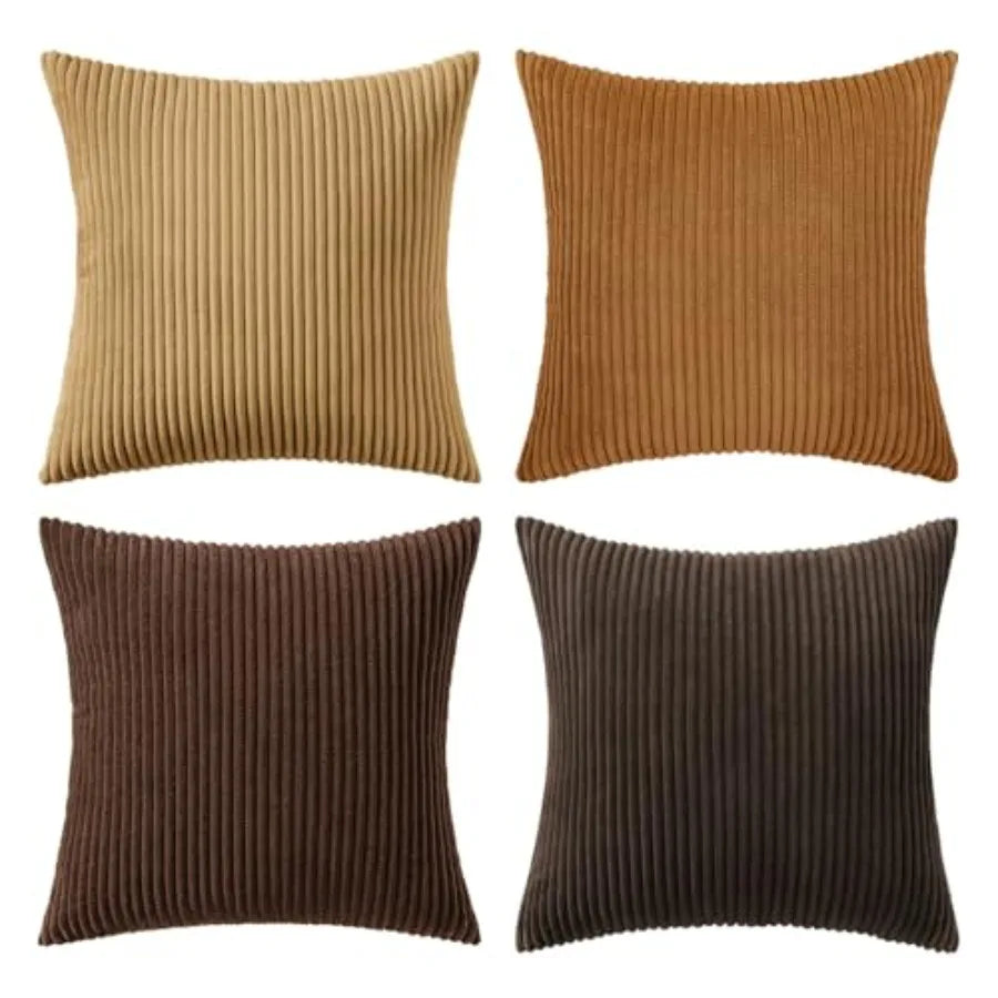 Four square ribbed throw pillows in different shades of brown and tan, arranged in a 2x2 grid on a white background.