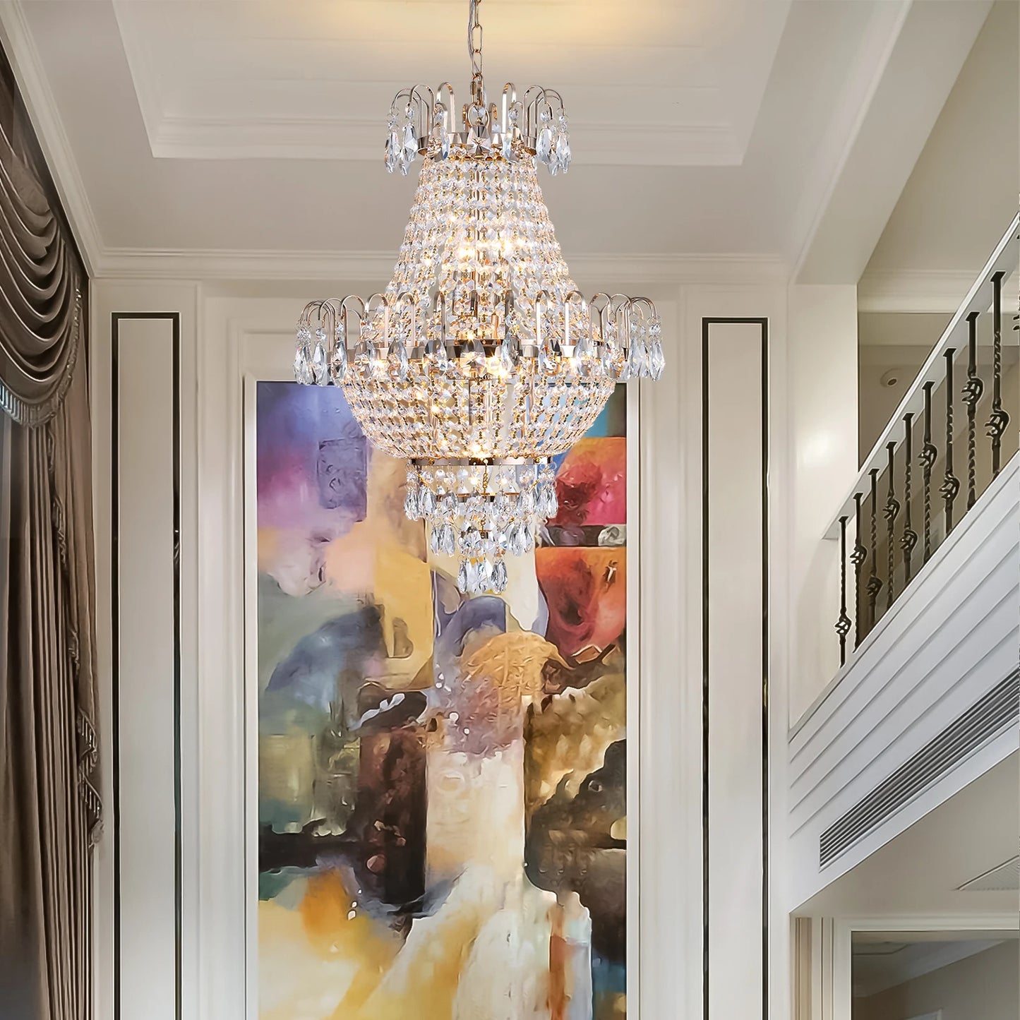Gold K9 Crystal Chandelier hanging in a foyer, adding sophistication and glamour to the entrance.