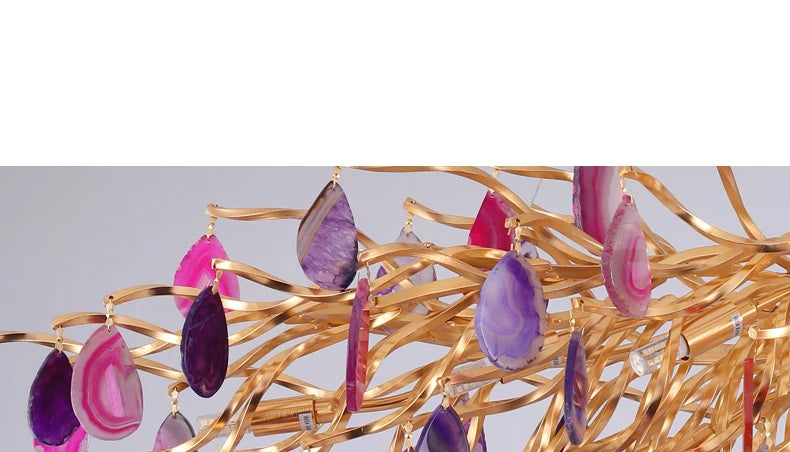 Colorful agate slices displayed on an art deco chandelier, perfect for adding sophistication to any room.