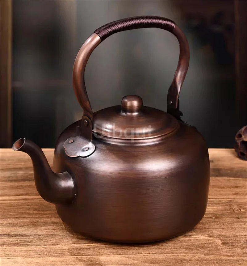Copper Teapot 100% Pure Handmade – Functional and stylish stovetop kettle on a modern electric stove.