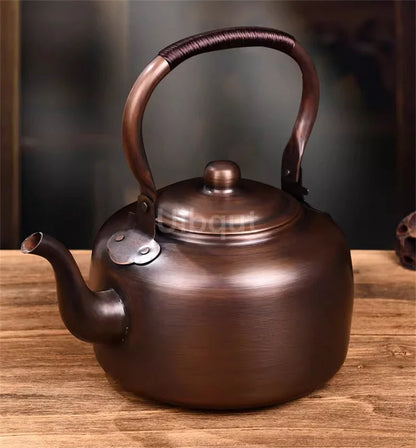 Copper Teapot 100% Pure Handmade – Functional and stylish stovetop kettle on a modern electric stove.