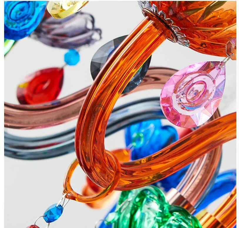Artistic Colorful 100% Crystal Pendant Lamp radiating warm light, creating a cozy atmosphere in living rooms or dining areas.