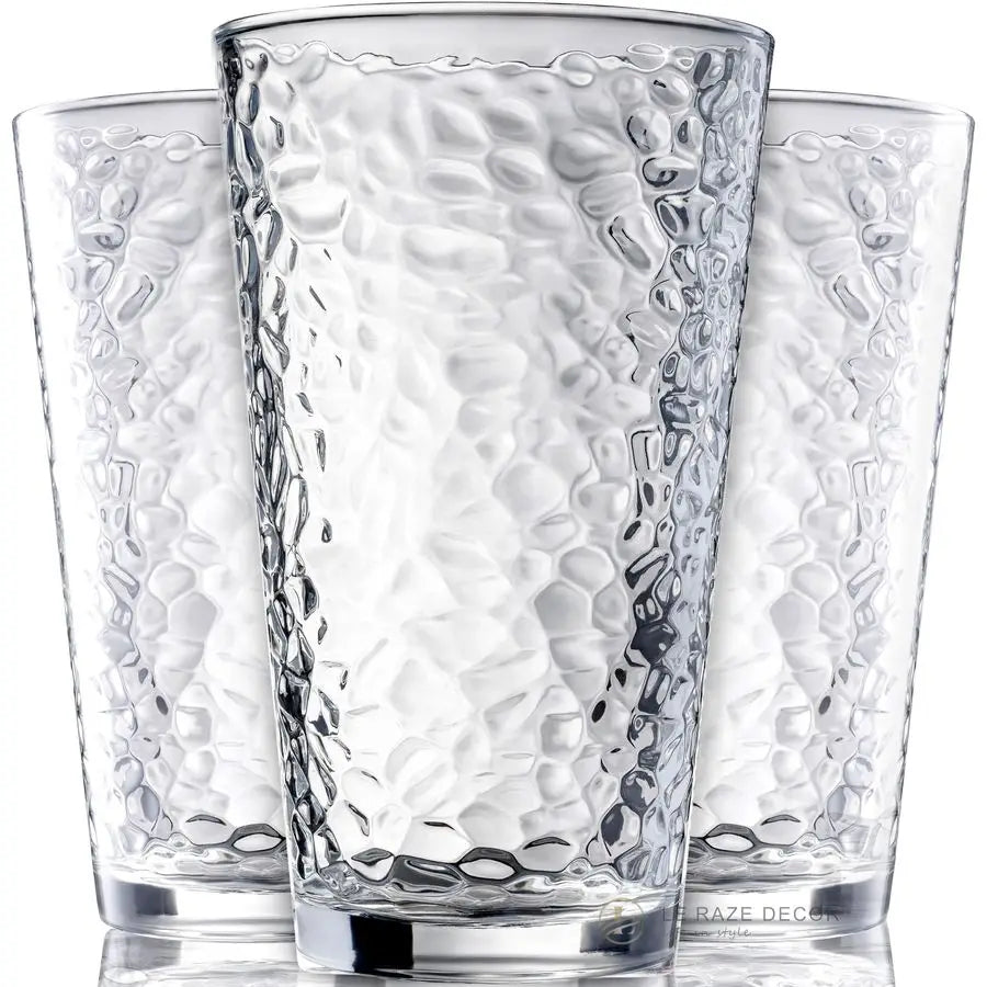 Stylish hammered glass tumblers, each holding 16oz, showcasing their versatility for modern and rustic decor.