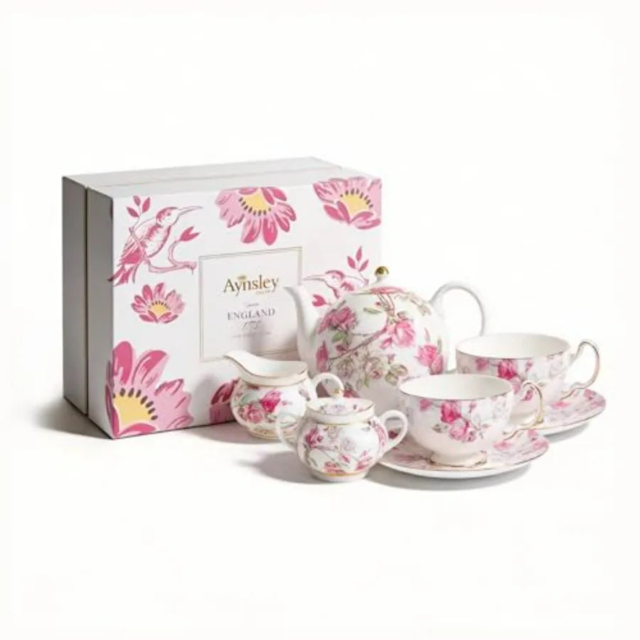 Aynsley 7-Piece Tea Set features cups and saucers elegantly arranged for an afternoon tea gathering.
