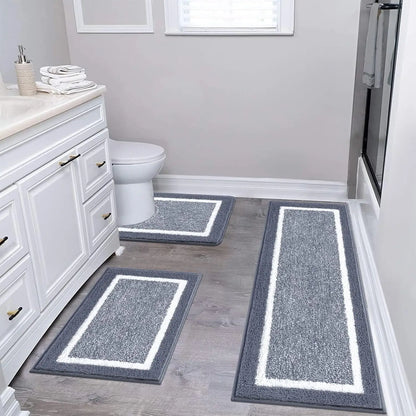 3-Piece Ultra-Soft Gray Bath Mat Set with Non-Slip Backing, showcasing its luxurious feel and modern design. Perfect as a gray bath mat set for your stylish bathroom.