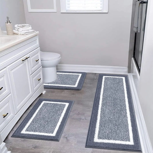 3-Piece Ultra-Soft Gray Bath Mat Set with Non-Slip Backing, showcasing its luxurious feel and modern design. Perfect as a gray bath mat set for your stylish bathroom.
