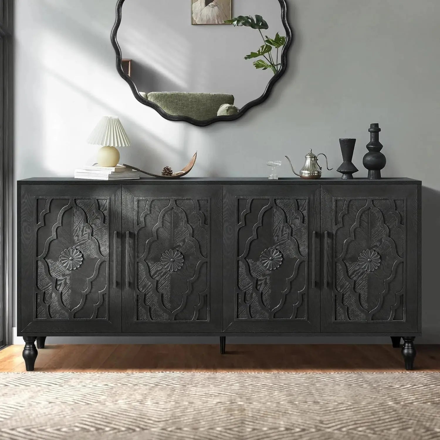 Antique Black Carved Sideboard with Carved Flower Doors styled with warm lighting and neutral décor, perfect for enhancing your home with an antique carved sideboard focal point.
