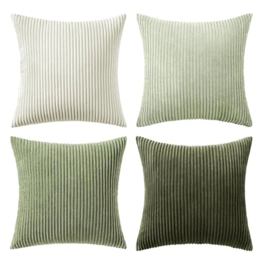 Four square ribbed throw pillows in different shades of green and beige, arranged in a 2x2 grid on a white background.