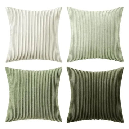 Four square ribbed throw pillows in different shades of green and beige, arranged in a 2x2 grid on a white background.