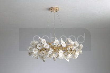 Elegant Gold Luxury Crystal Chandelier shining brightly as an impressive focal point, the ultimate gold crystal chandelier for home decor.