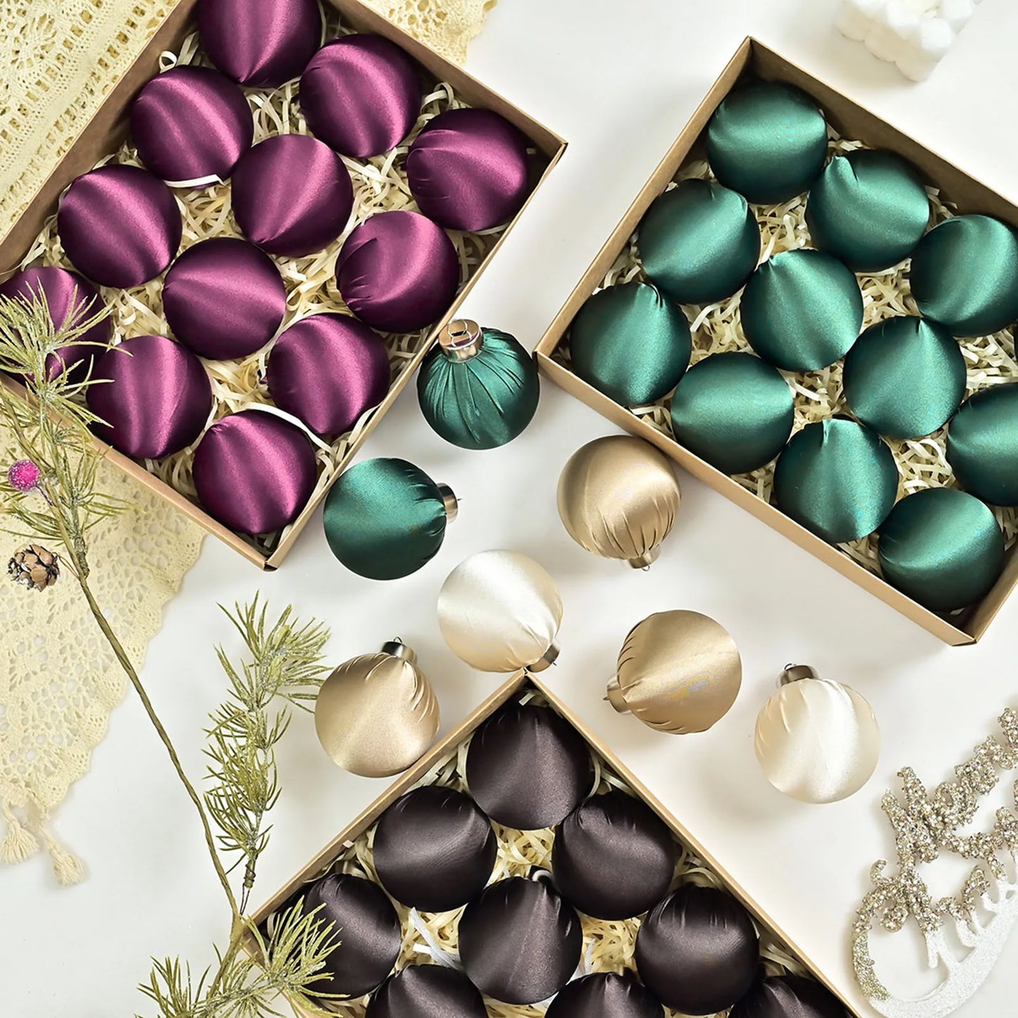 A beautifully arranged display of colorful Satin/Silk Christmas Hanging Ball Ornaments, including red and navy options among the satin silk ball ornaments.
