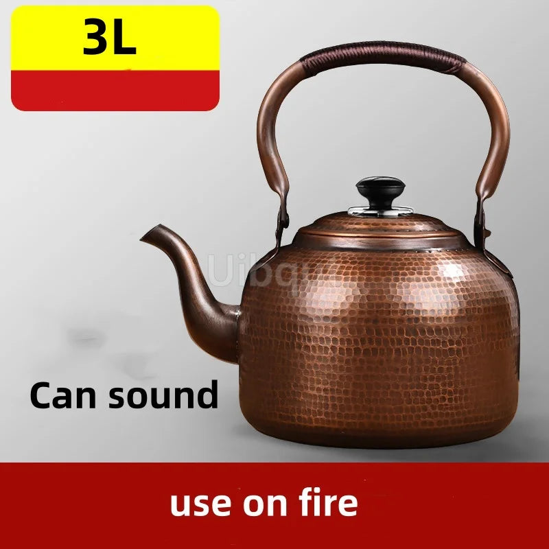 Copper Teapot 100% Pure Handmade – Traditional silhouette of the vintage teapot on a kitchen shelf.