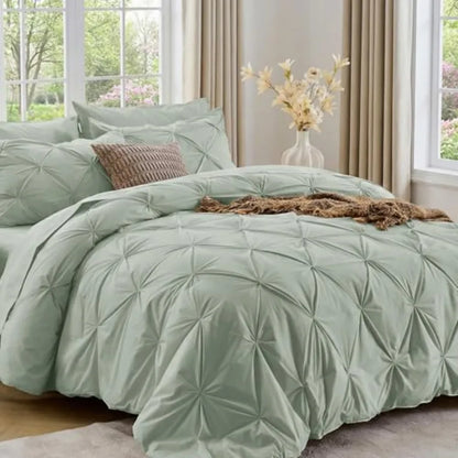 The stylish pinch pleat detail on this Queen comforter set offers a touch of elegance, making your bedroom a peaceful retreat.