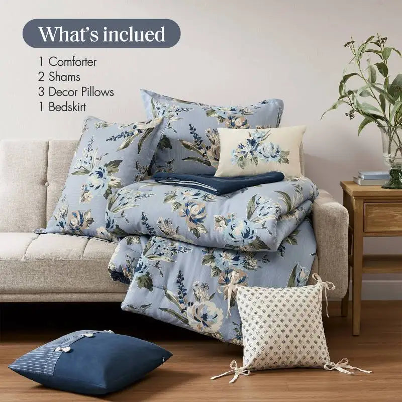 Close-up view of the Vintage Floral pattern on the 7-Piece Queen Size Comforter Set, featuring delicate blue flowers for added charm.