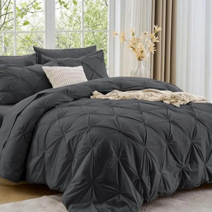 The chic and sophisticated Queen 7-Piece Pintuck Comforter Set brings a refined touch to your bedding while providing exceptional warmth.