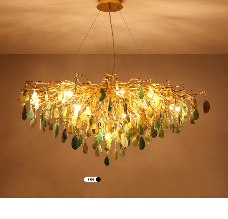 Stylish art deco chandelier with colorful agate, providing bright LED light to a modern living space.