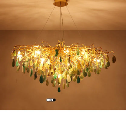 Stylish art deco chandelier with colorful agate, providing bright LED light to a modern living space.