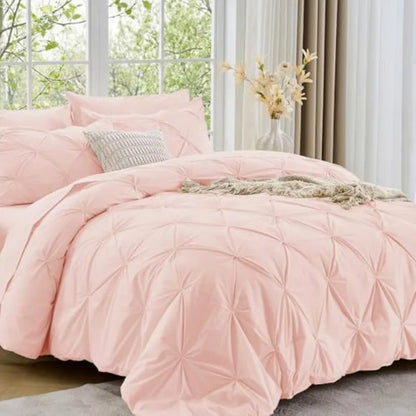 Cozy up in luxury with our Queen 7-Piece Pintuck Comforter Set, designed with soft microfiber for a serene sleep experience.
