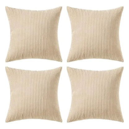 Four square throw pillows in a beige corduroy fabric, arranged in a 2x2 grid on a plain white background.