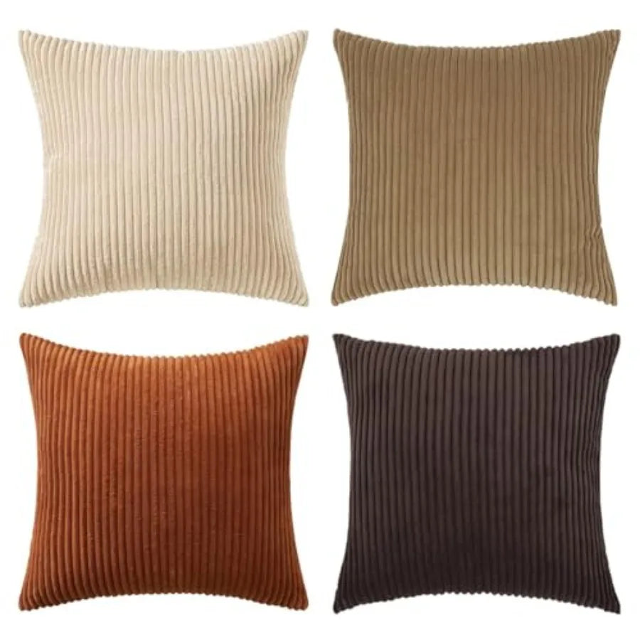 Four ribbed texture pillows in beige, brown, orange, and black on a white background.