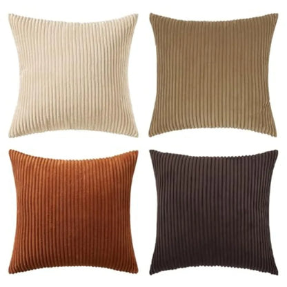 Four ribbed texture pillows in beige, brown, orange, and black on a white background.