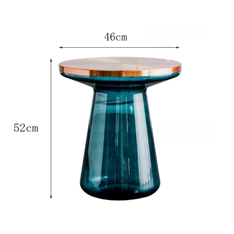 The Luxurious Modern Round Coffee Table displayed with decorative items, illustrating its functionality as a stylish coffee table.