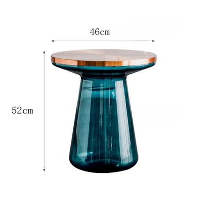 The Luxurious Modern Round Coffee Table displayed with decorative items, illustrating its functionality as a stylish coffee table.
